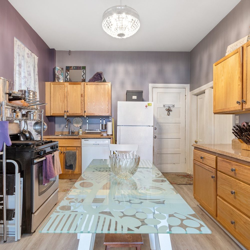 1311 W. Ohio St.: Before · kitchen, 2024 listing